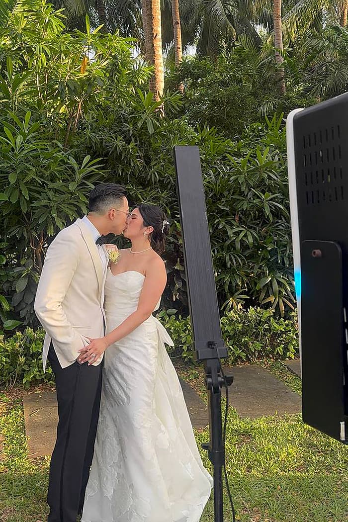 Guests enjoying a photobooth at a Boracay wedding
